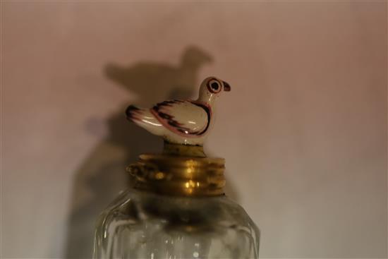 A late 18th century gold mounted glass scent bottle, the dove stopper possibly St James porcelain, H. 5.2cm, with original leather ca